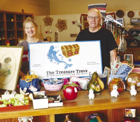 LORI AND VERLEN LARSEN are pictured inside their new business in downtown Dannebrog, The Treasure Trove. Photo by Michael Rother