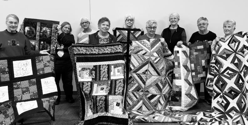 MEMBERS OF THE ST. PAUL COUNTRY QUILTERS who showed off their 2025 challenge projects during last week’s meeting included Marylynn Sharton, Linda Kanter, Betty Van Dyke, Julie Rosner, Pat Kuchta, Dee Kuszak, Marilyn Schmaljohn, Kathy Meyer, and Nancy Psota. Courtesy Photo