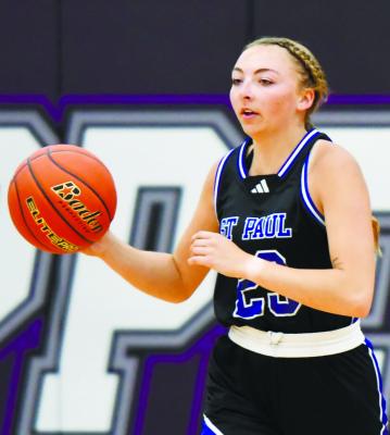 ST. PAUL’S CHARLEE WEGNER brings the ball up the court during last week’s New West All-Star Classic at Minden High School. The LouPlatte Conference All-Stars, Wegner’s team, fell to their opponents representing the Southwest Conference last Thursday in Minden. Photo by Jordan Coslor