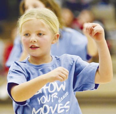 MAKING THE RIGHT MOVES was a large group of aspiring dancers during halftime of the St. Paul versus Arcadia/ Loup City boys’ basketball game on December 20th.