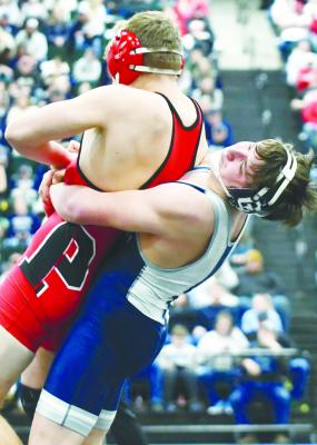 CENTRAL VALLEY’S TANNER SCHULTZ works to throw Plainview’s Aiden Hamilton during the Cougars’ dual with the Pirates in the quarterfinal round of last Saturday’s NSAA Class D State Dual Wrestling Championships at the Buffalo County Fairgrounds in Kearney. Photo by Jordan Coslor