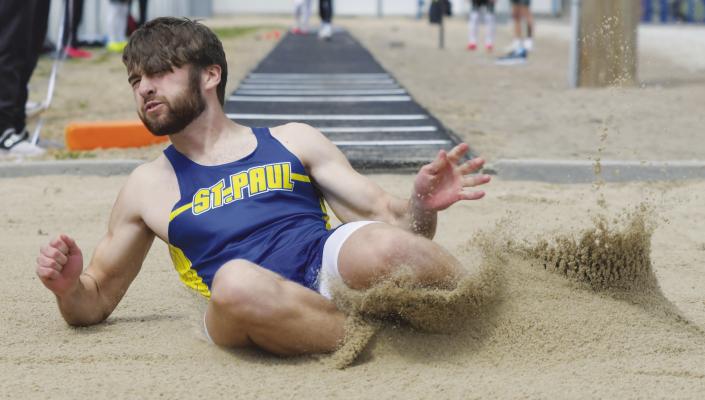 TRENTON HANSEN set a new school record and a personal best when he won the long jump at last week’s LouPlatte Conference track meet held in St. Paul. Hansen recorded a jump of 21-09.5 for the gold. (Michael Happ)