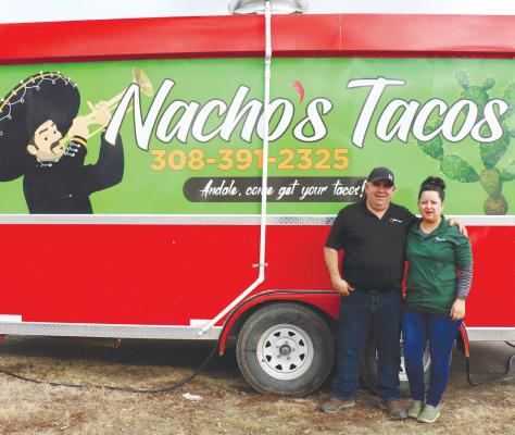 IGNACIO “NACHO” AND MARISELA GUZMAN have become a familiar staple in the local food truck scene with their Nacho’s Tacos food truck. The couple has recently grown their business with a second truck. Photo by Michael Rother