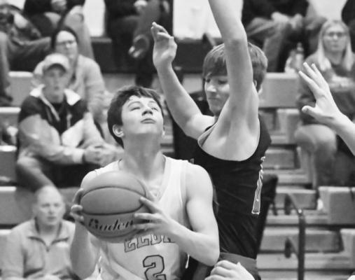 ELBA junior Zach Leech drives the baseline on his way to the basket last Tuesday during the Bluejays’ game against High Plains. Photo by Michael Happ