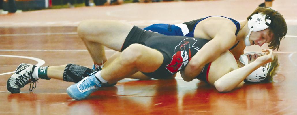 MASON MAJERUS works to pin Gavin Schriner of Arcadia/Loup City during the semifinals of the LouPlatte Conference Wrestling Tournament at Ord High School last week. Majerus placed second at 150-pounds during the tournament. Photo by Michael Happ