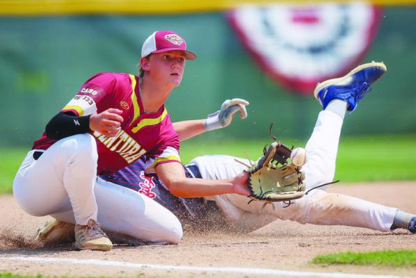 WYATT DVORAK catches a ball at third base, attempting to tag out a Lincoln Lutheran baserunner in Centura’s 11-5 win last Monday. Dvorak finished the game with one hit. Photo by Jeromy Vauble