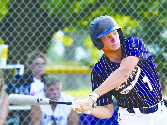 MASON MAJERUS picks up a hit during last week’s second round district game between St. Paul and Palmer-Wolbach- Greeley in Silver Creek. Photos by Michael Happ