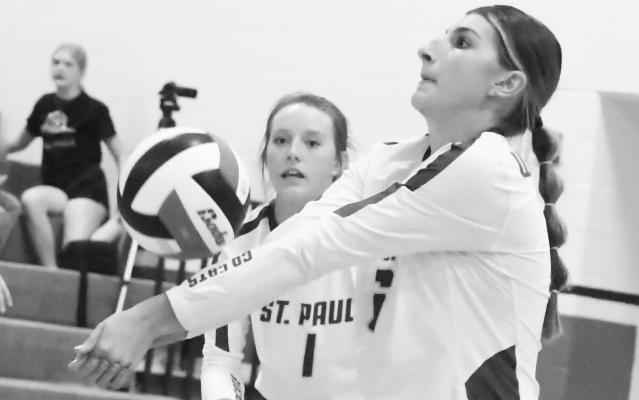 ST. PAUL’S Aubree Fitzgerald digs up a shot from Arcadia/Loup City during the first set of last week’s triangular with the Rebels and Ravenna. Photos by Michael Happ