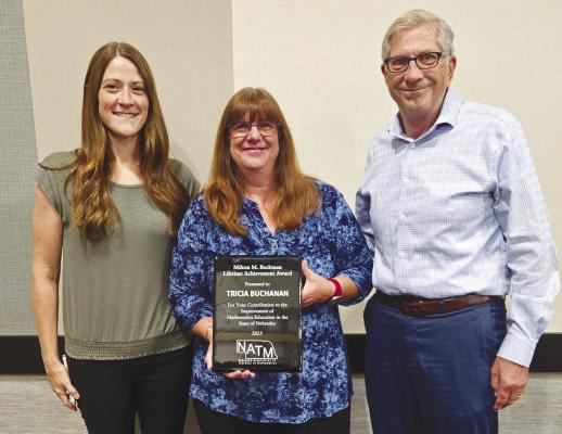 ST. PAUL MATH EDUCATOR TRICIA BUCHANAN was recently honored with a Milton M. Beckman Lifetime Achievement Award by the Nebraska Association of Teachers of Mathematics. Buchanan is pictured alongside St. Paul High School Counselor Jaime Camden and High School Principal Richard Moore. Courtesy Photo