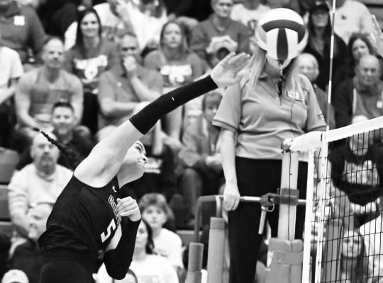 CENTURA’S TAYA TAUKIUVEA goes for a kill from left pin during the Centurions’ match against Norfolk Catholic on Saturday. The Knights swept the Centurions during the district final. Photos by Michael Happ
