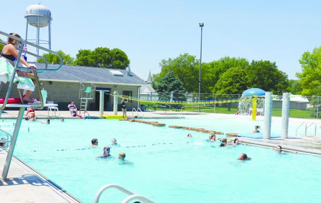 KIDS OF ALL AGES enjoyed the cool waters of the St. Paul Water Park on Monday afternoon. The water park’s opening was delayed this year due to unseasonably cool termperatures. Photo by Michael Rother