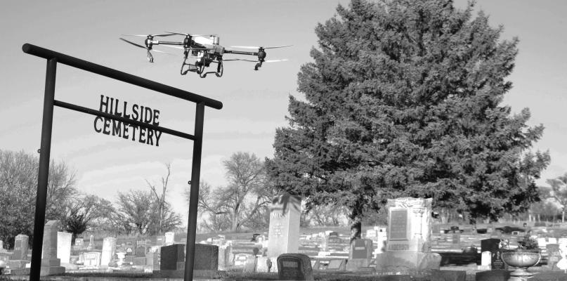 PRECISION DRONE SOLUTIONS used its drone to spray Hillside Cemetery on Sunday. The application was made possible thanks to the community’s ongoing support of the Wolbach cemetery. Photo by Michael Rother