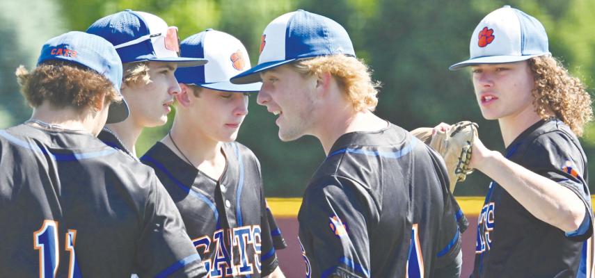 MEMBERS of the St. Paul/Palmer Cats gather before taking the field at Fricke Field on Saturday for the opening game of the 2025 NSAA Class C State Baseball Tournament. Photos by Michael Happ