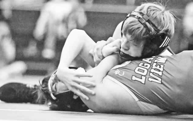 RYLAN RASMUSSEN needed just twenty-two seconds to pin Logan View’s Jayce Grover during last week’s dual between the Wildcats and the Raiders. Photo by Michael Happ