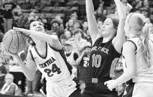 PAIGE CRAWFORD looks to the basket on Friday night when Centura played Elgin Public/Pope John in the quarterfinals of the NSAA State Girls Basketball Tournament. Crawford chipped in four points in the game. (Michael Happ)