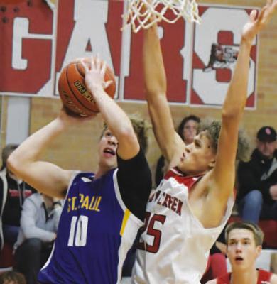 ST. PAUL senior John Placke goes up for a shot during Friday evening’s game against Sandy Creek. (Michael Happ)