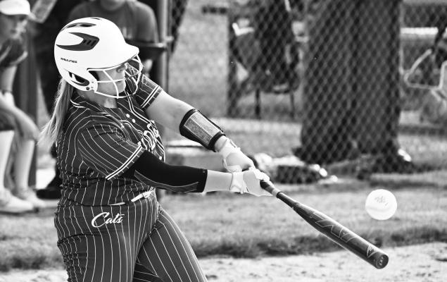 ST. PAUL’S AVERY HANSEL makes contact during the second inning of last week’s game against Milford. The Wildcats fell to the Eagles 6-1 during last Thursday’s game. Photos by Michael Happ