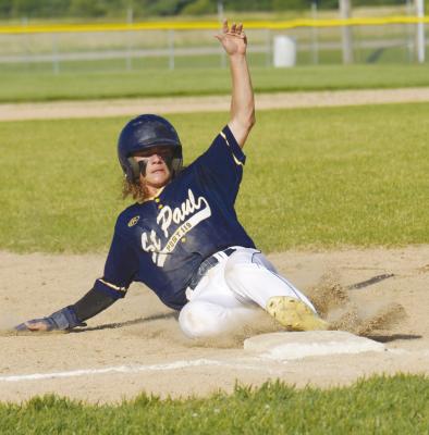 ZANDYN WELLER steals third base during last Tuesday night’s Area C-5 Championship game between St. Paul Post 119 and Palmer-Wolbach-Greeley. Photos by Michael Happ