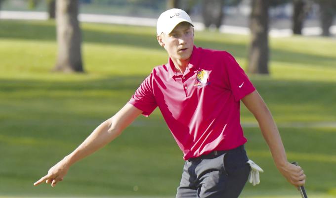 ST. PAUL senior Sam Wells watches his putt during the playoff hole at the NSAA Class C State Golf Tournament last week. Wells beat Kearney Catholic’s Nash Malone in the playoff to win the Class C individual title. Photos by Michael Happ