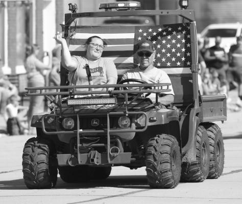 ESTHER AND WAYNE REIMERS rode through this year’s parade with the Boelus Volunteer Fire Department.
