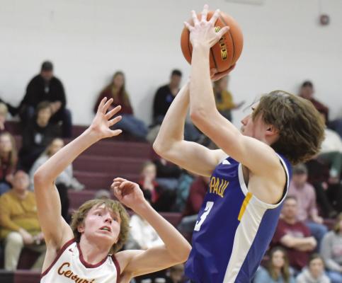 BRYCE KNAPP floats a jumpshot from the lane during the final minutes of last week’s subdistrict final game at Centura. Knapp had ten points for the Wildcats last week. (Michael Happ)