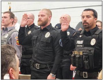 ST. PAUL Police Officer Jade Stethem (center) was among forty-four individuals who graduated from the Nebraska Law Enforcement Training Center in Grand Island last week. (Courtesy Photo)