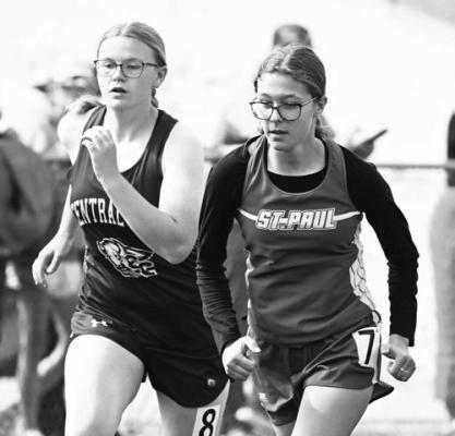 JULIA KLEINSASSER jockeys for position at the start of the girls’ 3200-meter run on Thursday afternoon at the Ord Invite. Kleinsasser placed sixth in the race at 15:03.28. Photos by Michael Happ
