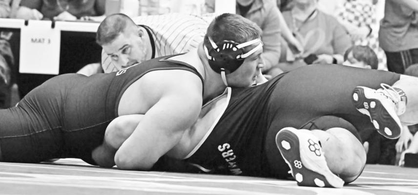 CENTURA’S KOLTEN SIMONS managed to pick up his second victory of the day on Saturday when he pinned Brenden Gabel of Cross County/Osceola. Photo by Michael Happ