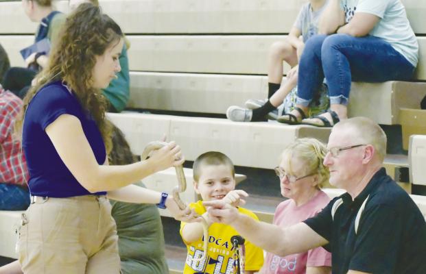 KIDS AND ADULTS of all ages enjoyed the Wildlife Encounters Nebraska exhibit during St. Paul Public School’s annual Back to School Open House. Jillian Lenz led the program, which ran throughout part of the district’s annual back-to-school event. Photos by Michael Happ