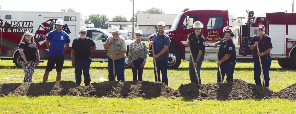 BREAKING GROUND on the City of St. Paul’s new fire station on July 18th were St. Paul City Council members Katie Kowalski, Brian Sack, Bill Peters, and Chuck Schmid; City Clerk Connie Jo Beck; St. Paul Mayor Mike Feeken; Fire Chief Mike Becker; Rescue Captain Nate Meyer; and St. Paul Rural Fire Protection District Board President Dennis Sperling. Photo by Michael Happ