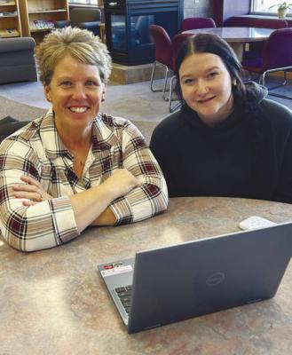 MENTOR DR. ANGELA BRENNAN is pictured alongside her mentee during a meeting at the St. Paul Library. St. Paul Public Schools currently has fifty-one matches in the TeamMates Mentoring Program. Courtesy Photo