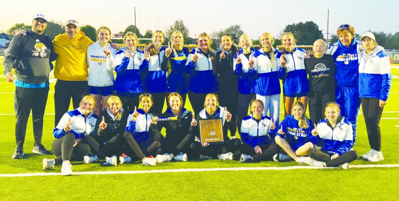 Members of the St. Paul girls conference championship track and field team include (back row): Coach Deven Solko, Coach Matt Koehn-Fairbanks, Katie Kleinsasser, Carly Stepanek, Annie Stepanek, Piepyr Klinginsmith, Tessa Dugan, Macy Porter, Johannah Nilson, Kyndel Sack, Ava Petersen, Delaney Jennings, Coach Stacey Keller, and Coach Megan Lewis; (front row): Madison Klanecky, Keislyn Poss, Zaya Lewis, Katie Oakley, Charlee Wegner, Kamden Sack, Madi Shippen-Bellamy, and Alexis Galusha.
