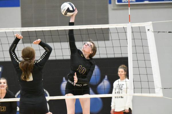 JAIME WYSOCKI goes for a kill during Monday night’s subdistrict semifinal match against Ansley-Litchfield. The Spartans swept past the Bluejays, ending Elba’s season. (Jordan Coslor)