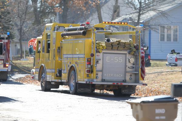 FIREFIGHTERS work to vent the attic of a home on the 300 block of Sixth Street in St. Paul last Friday afternoon. The local department was called to the scene just before noon on November 11th. (Michael Happ)