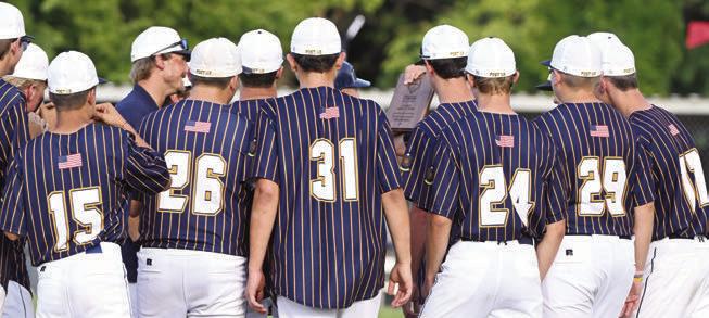 THE ST. PAUL JUNIORS are awarded the Class C Area 5 plaque after their 13-0 shutout victory over Palmer-Wolbach- Greeley last Tuesday evening at Silver Creek. Photos by Michael Happ