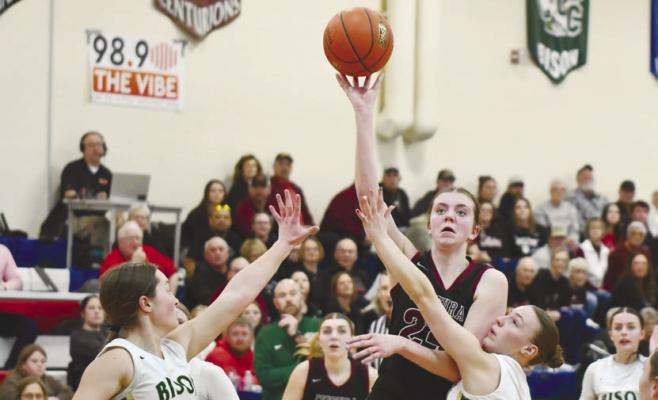 CENTURA’S KENNEDY DAVIS fights past Central City’s defense during last week’s LouPlatte Conference championship game in Gibbon. The Bison beat the Centurions 33-32 for the conference title. Photos by Jordan Coslor
