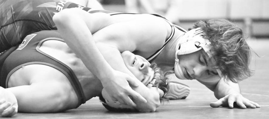 ST. PAUL SENIOR ALEX MEINECKE pinned Fairbury’s Carter Johnson in the second period of the Wildcats’ final match against the Jeffs at Friday afternoon’s St. Paul Dual Wrestling Tournament. St. Paul beat Fairbury in the dual 54-30. Photos by Michael Happ