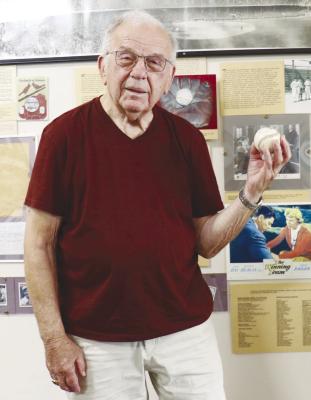 BILL WENKE, a St. Paul native from Spokane, Washington, donated a baseball to the Museum of Nebraska Major League Baseball last Wednesday. The baseball had been signed by Howard County native Grover Cleveland Alexander. Photo by Michael Rother