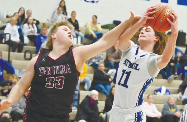 ST. PAUL’S ZANDYN WELLER fights with Centura’s Jax Campbell for a rebound during the second half of last week’s game between the Wildcats and the Centurions at St. Paul High School. Photos by Michael Happ