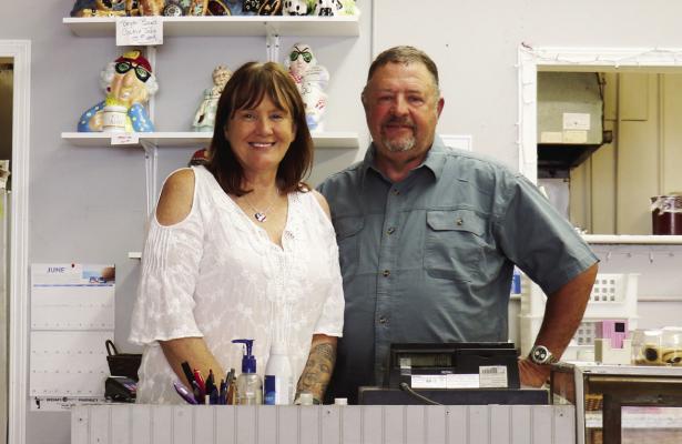 SHANNON AND DAN BERGMAN, who recently purchased the Sweet Shoppe in St. Paul, are pictured inside the St. Paul establishment on Monday. Michael Rother