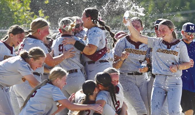 MEMBERS of the Centura High School softball team celebrate their sweep of Malcolm in the C-7 District Final on Friday afternoon. The Diamonds blew past the Clippers 13-5 and 13-1 in the best-of-three final. Photos by Michael Happ