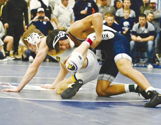 CENTRAL VALLEY’S JAIRO LAZOS went the distance, and then some, against Shelby-Rising City’s Jett Vrbka in the finals at 165-pounds on Friday. Lazos staged a comeback in the match, but ultimately lost by an 11-8 sudden victory. Photos by Michael Happ