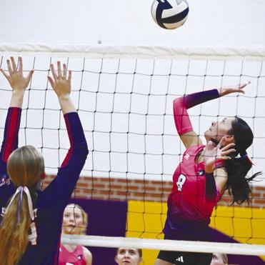 JARAHLYNN MORROW goes for a kill against a High Plains defender last Tuesday.