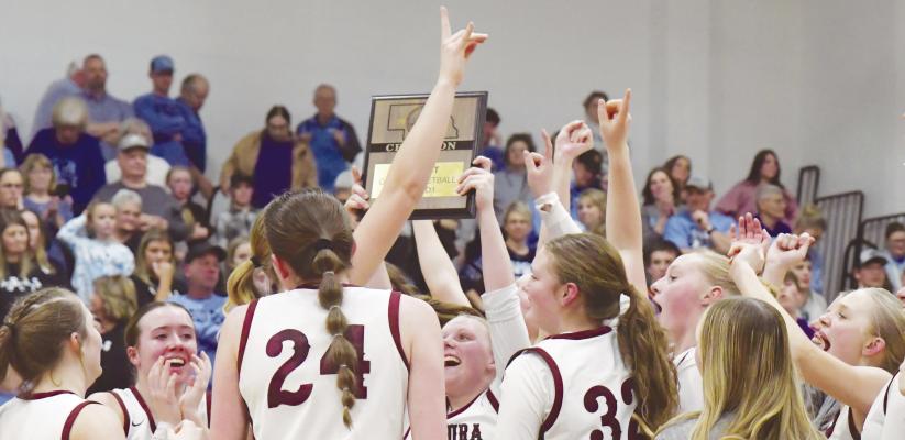 CENTURA’S GIRLS’ BASKETBALL TEAM celebrates following their 50-49 victory over Summerland on Friday night in the District D1-7 Championship game. The Centurions will play in the quarterfinal round of the state tournament, in Lincoln, on Thursday. Photos by Michael Happ