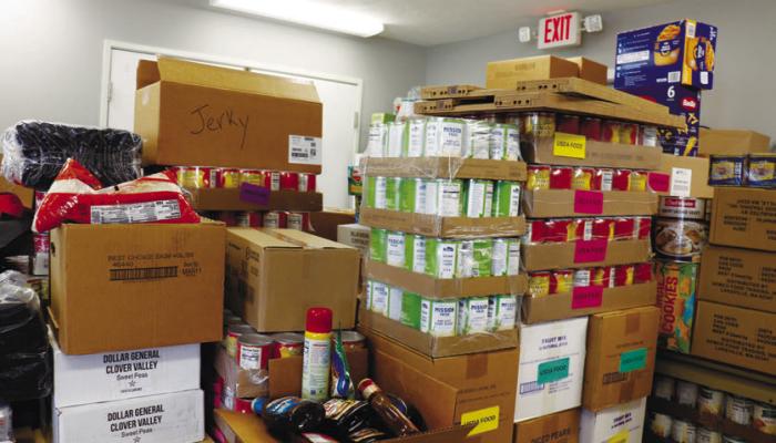 THE ORPHAN GRAIN TRAIN provided the Howard Greeley County Food Pantry a larger-than-expected donation on January 14th, forcing the St. Paul institution to reach out for some much-appreciated help from St. Paul Public Schools. Photo by Michael Rother