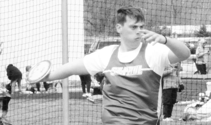 ST. PAUL senior Isaac Hagen unspooled for a best toss of 123-06 to win a gold medal at last week’s Ron Priebe Invite hosted by Gibbon High School. Hagen was one of three Wildcat boys to earn gold medals in the field on Thursday. Photos by Monte Steele
