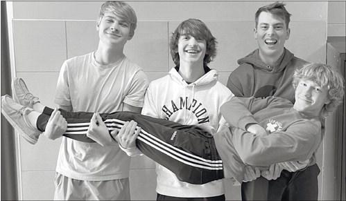 Courtesy Photo MR. SOLKO’S economics class and Ms. Stephanie Holdsworth’s Intro to Business classes teamed up to compete in the Nebraska Econ Challenge. The team of David Nall, Mason Childers, Isaac Hagen, and Spencer Koperski placed in the top five across the state of Nebraska. A top five finish qualified them for an in-person state competition in April along with teams from Lincoln Southwest, Waverly, and Seward.