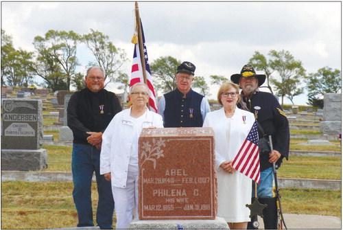 HILLSIDE CEMETERY was the site of a ceremony remembering the last Union soldier of the civil war to die in Greeley County last week. Participating in the ceremony from the Camp Harrison branch of the SUVCW DND were (back row) Chaplain Glenn Kietzmann, Former Department Commander Norm Weber, and Member Rick Marx; participating from Kady Brownell Tent 25 of the DUVCW were (front row), President Pat Wagner and Member Bev Schuele. Photos by Michael Rother