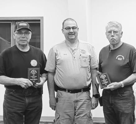 DANNEBROG EMT Captain Terry Webb recently presented Jerry Blake and Wayne Reimers plaques for thirty-five years of service to the Dannebrog Rescue Squad. Courtesy Photo
