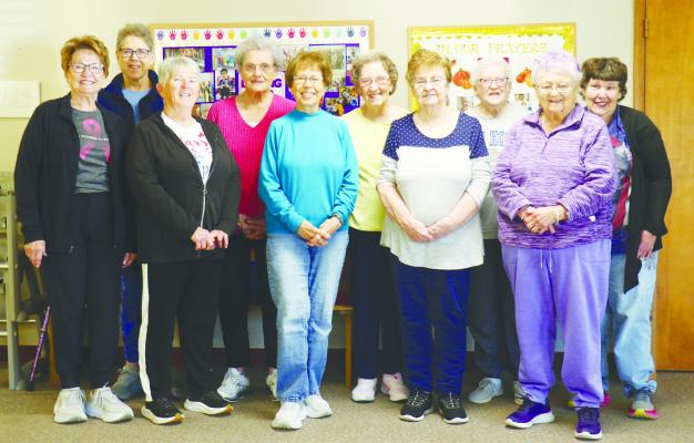 ST. PAUL FIT AND FABULOUS SENIOR EXERCISE CLASS participants include (back row): Janet Elstermeier, Dera Klanecky, Carolyn Just, Theda Van Horn, and Betty Jo Kauk; (front row): Ronna Christensen, Nancy Psota, Linda Schacht, Mary Cannon, and Jackie Mayberry; and (not pictured): Jackie Cook, JoAnn Danczak, Cathy Sikes, and Roxie Lehman. Photo by Michael Rother